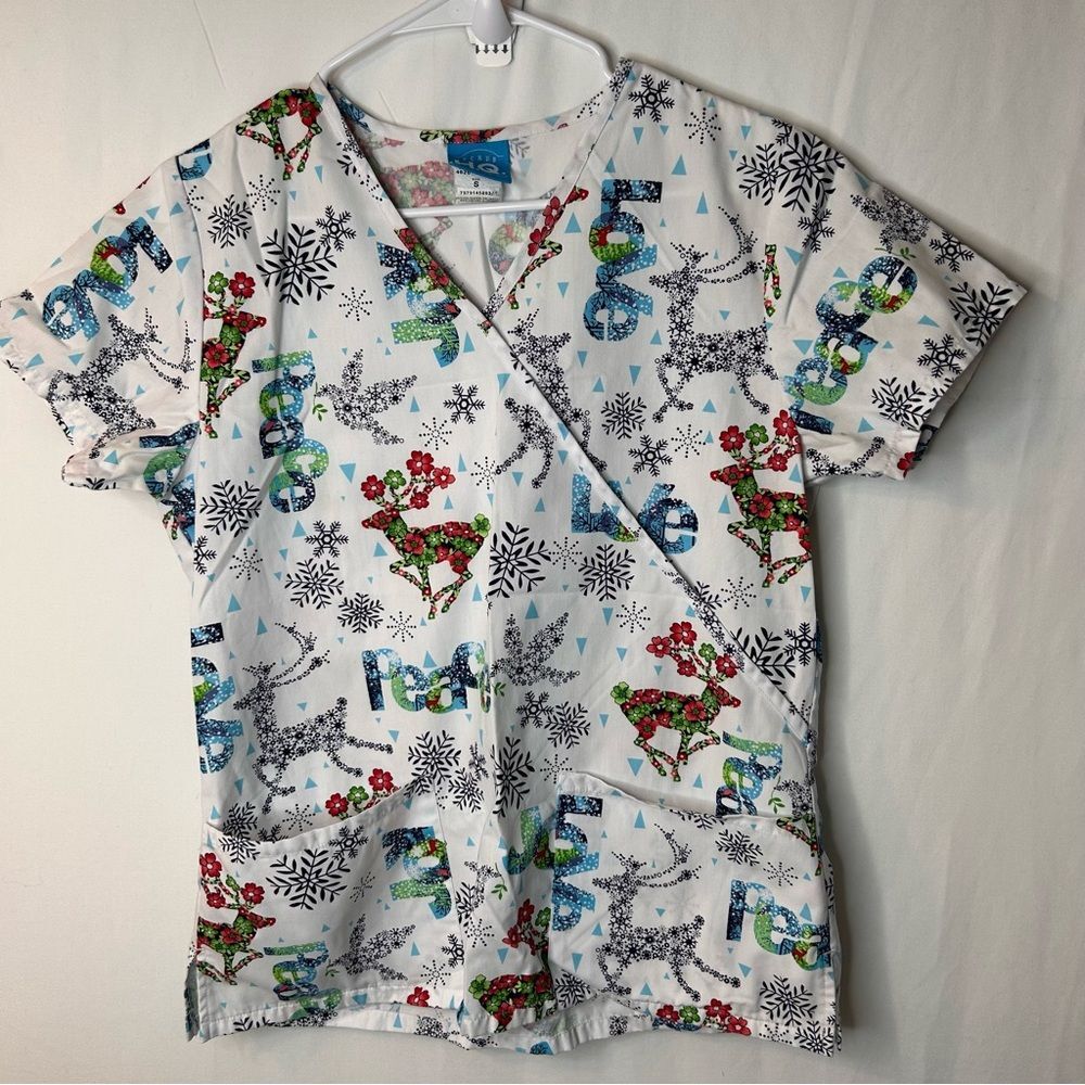 Scrub H.Q. Women’s White Peace Love Joy Short Sleeve Two Pocket Scrub Shirt. S